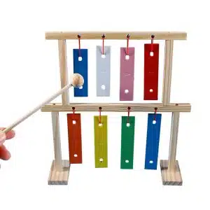 The musical instrument chime bells strike the eight-tone zither.